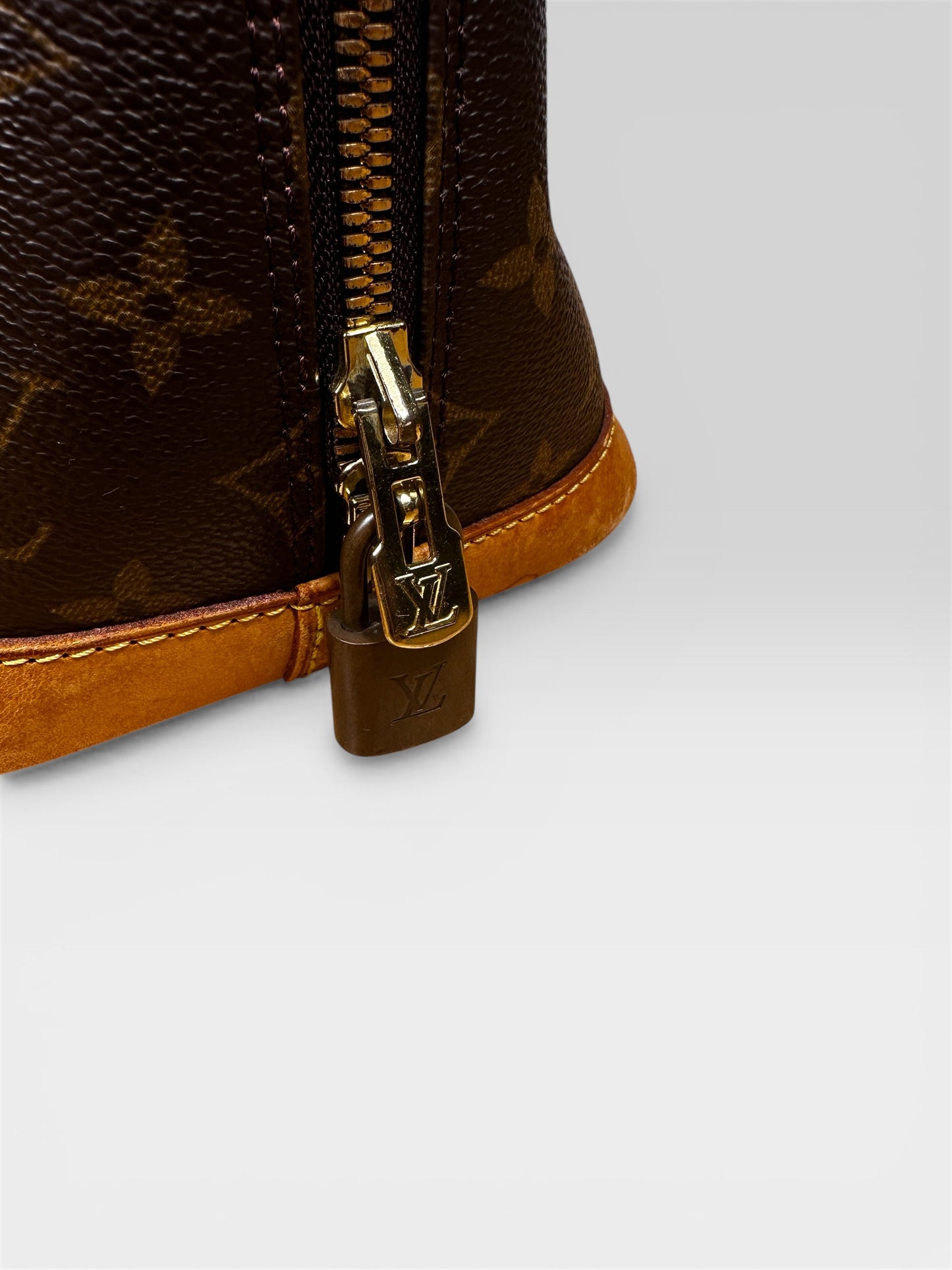 Louis Vuitton Alma Handbag